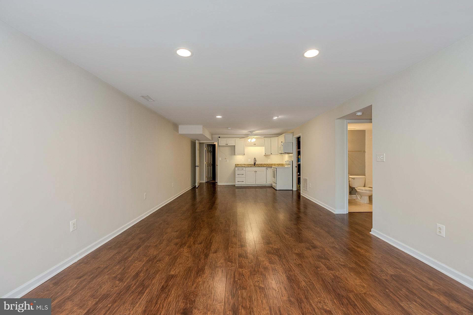 230 West Ridge Court Warrenton, VA 20186 - Photo 31 of 44 a view of empty room with wooden floor