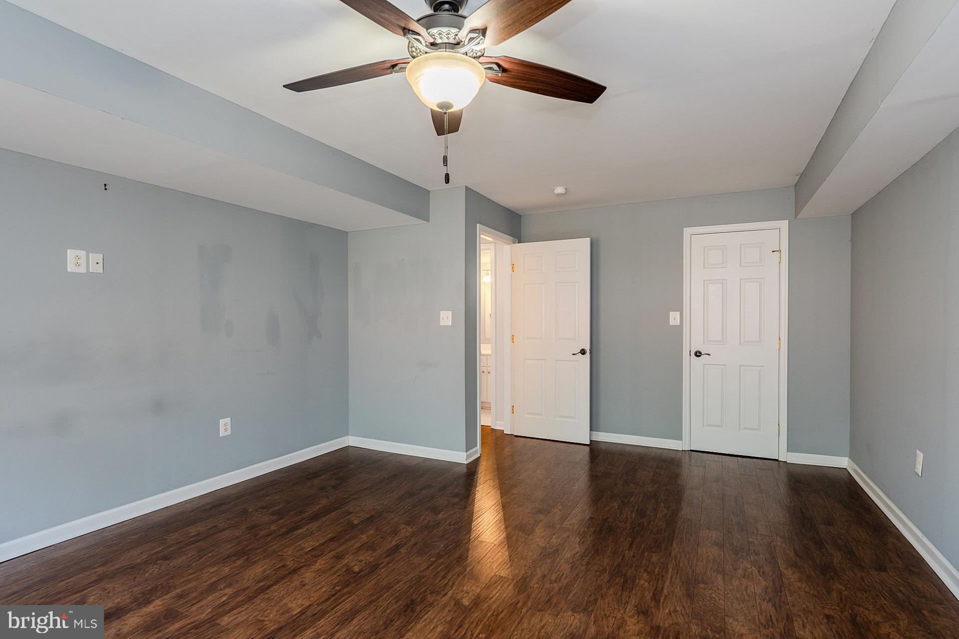 230 West Ridge Court Warrenton, VA 20186 - Photo 33 of 44 a view of an empty room with wooden floor