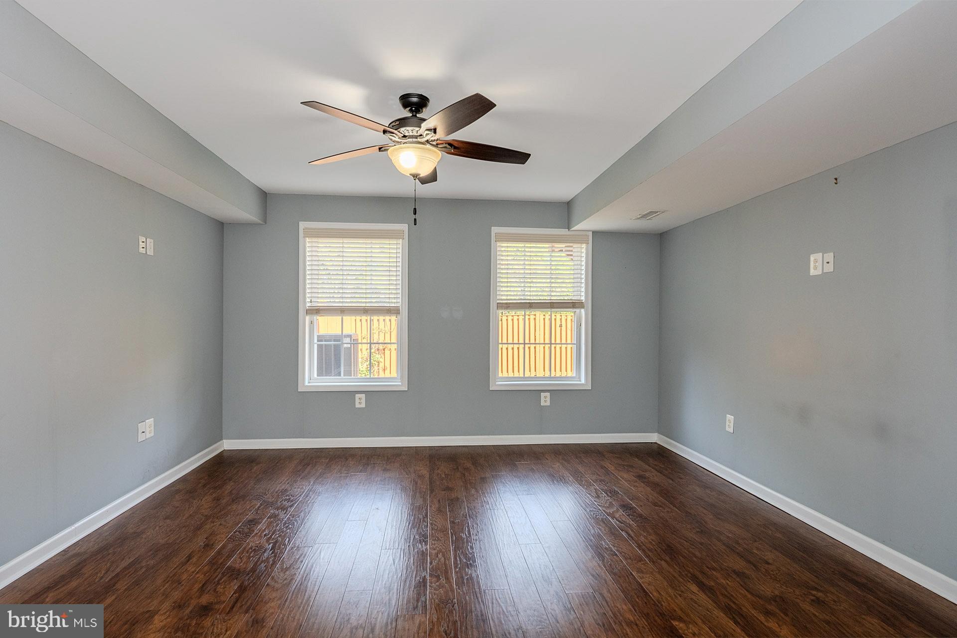 230 West Ridge Court Warrenton, VA 20186 - Photo 34 of 44 a view of an empty room with wooden floor and a window