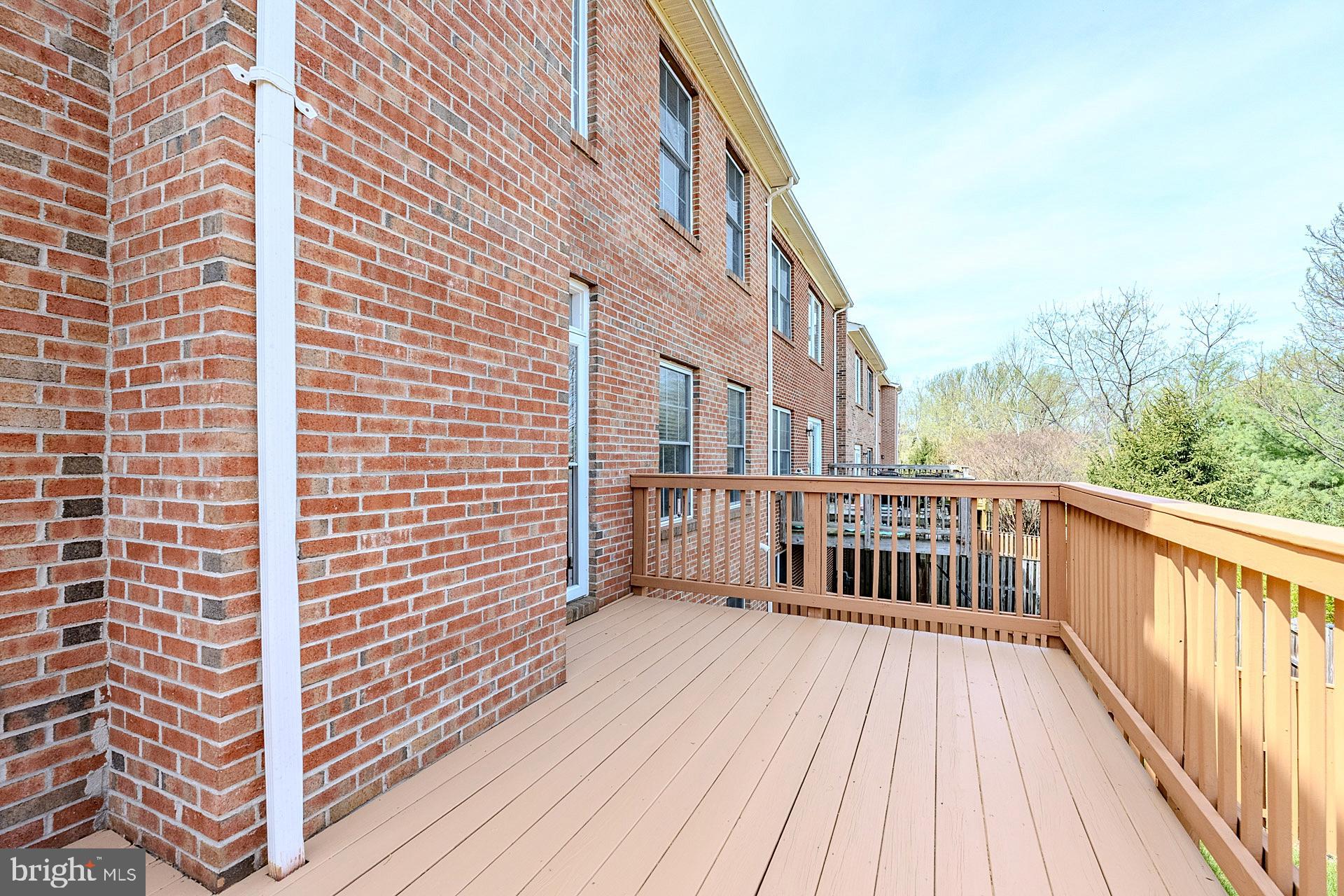 230 West Ridge Court Warrenton, VA 20186 - Photo 40 of 44 a view of a brick building from a balcony