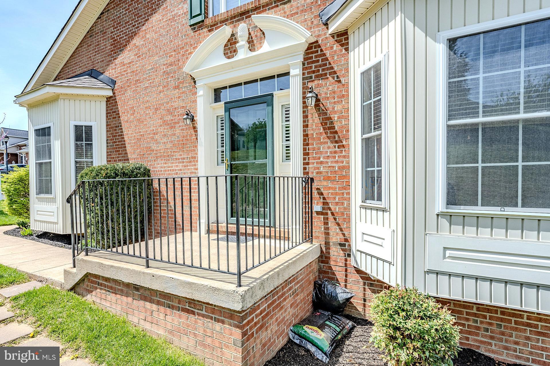 230 West Ridge Court Warrenton, VA 20186 - Photo 6 of 44 a view of a balcony with a garden