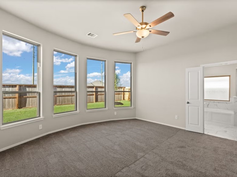 17314 Merry Lea Lane Hockley, TX 77447 - Photo 4 of 7 a view of an empty room with a window