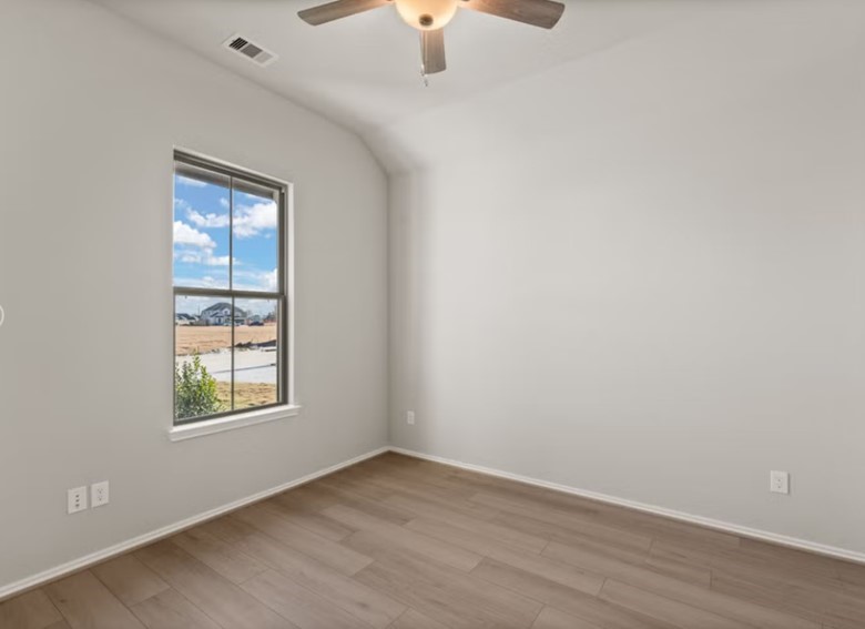 17314 Merry Lea Lane Hockley, TX 77447 - Photo 5 of 7 an empty room with a window