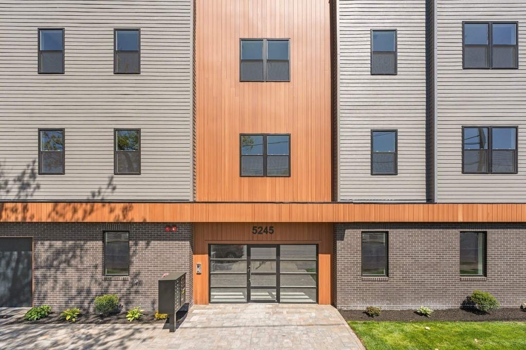 5245 Washington Street, Unit 6 Boston, MA 02132 - Photo 3 of 22 a front view of a building