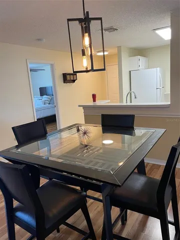 a view of a dining room with furniture