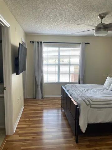 a room with a bed and a window