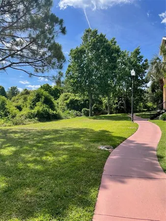 a view of a garden with a lake