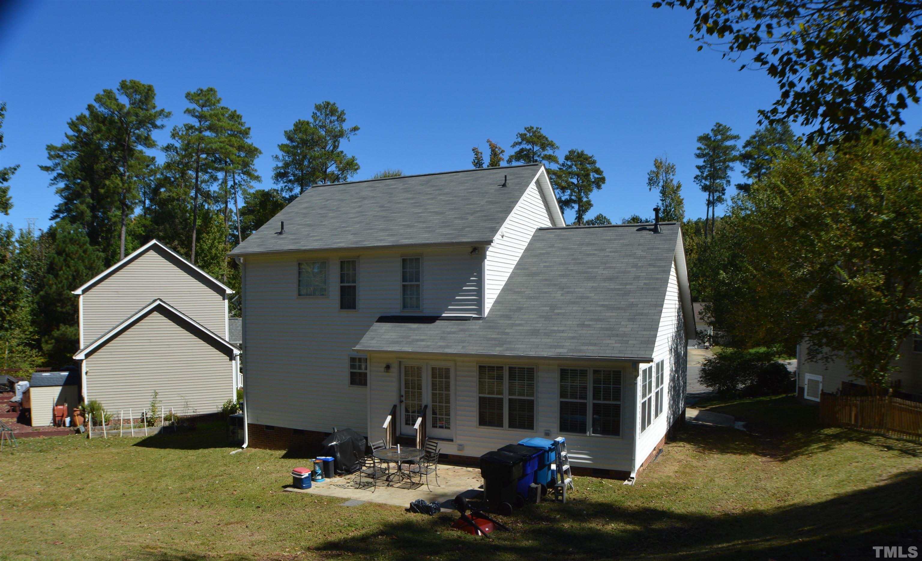 6523 Caverstone Lane Durham, NC 27713 - Photo 24 of 29 a aerial view of a house with swimming pool and sitting area