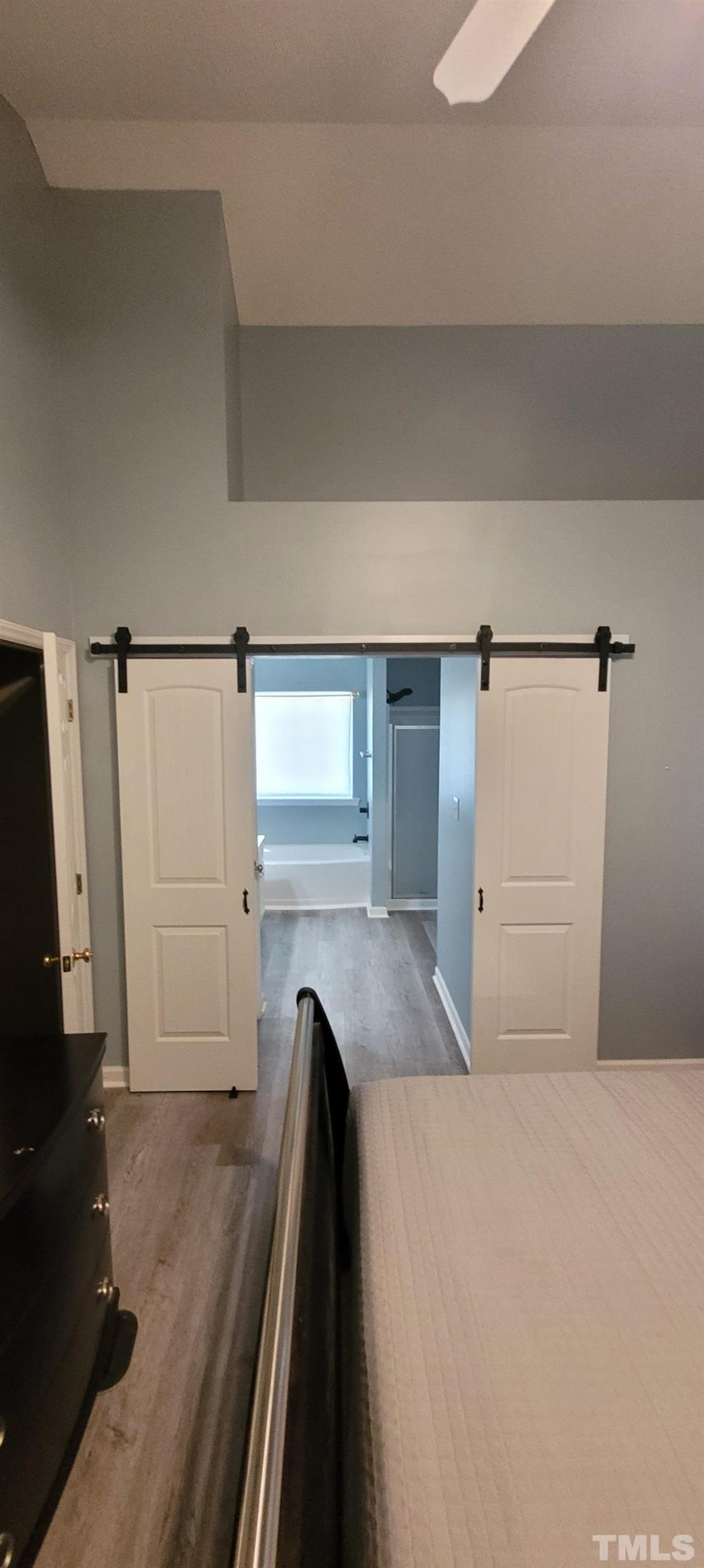 6523 Caverstone Lane Durham, NC 27713 - Photo 26 of 29 a view of a bedroom from a balcony