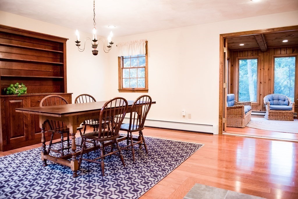 39 George Brown Street Billerica, MA 01821 - Photo 12 of 29 a view of a dining room with furniture and chandelier