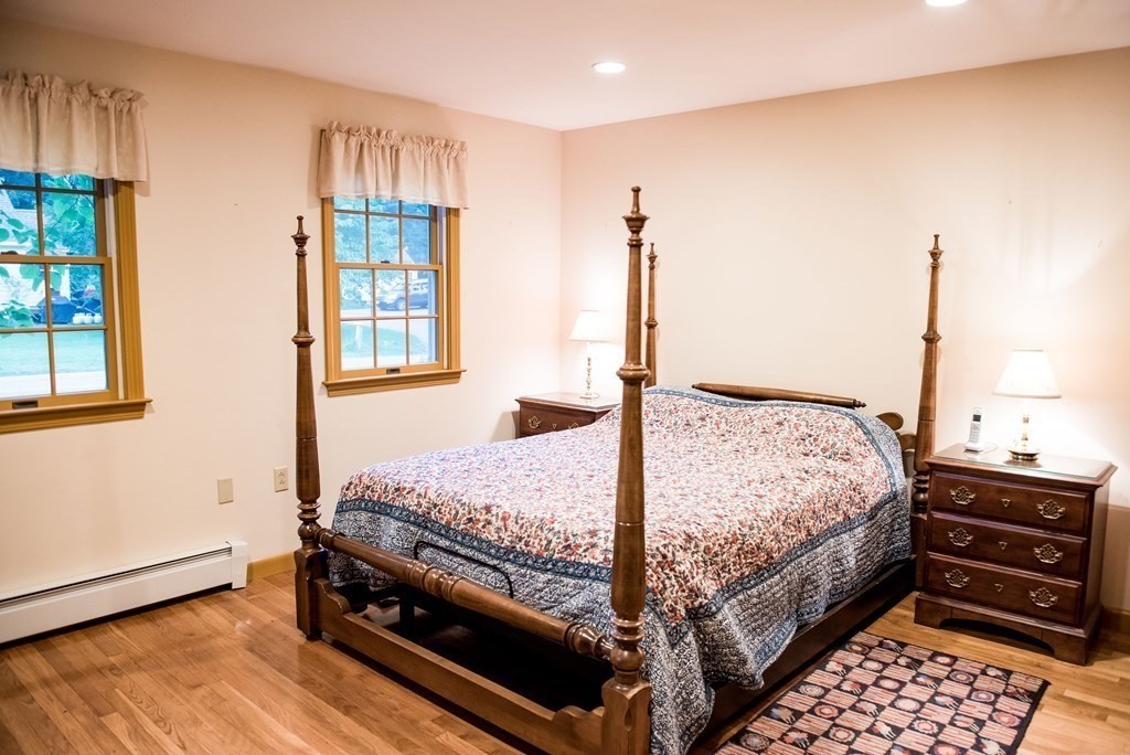 39 George Brown Street Billerica, MA 01821 - Photo 14 of 29 a bed sitting in a bedroom next to a window