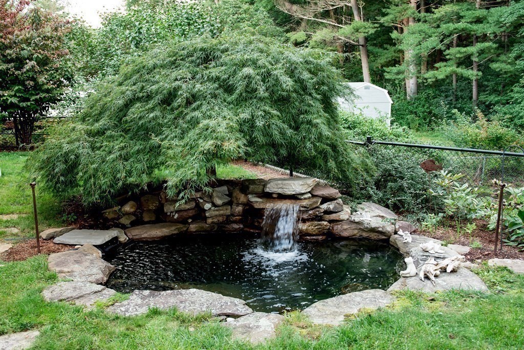 39 George Brown Street Billerica, MA 01821 - Photo 21 of 29 a view of a garden with sitting area