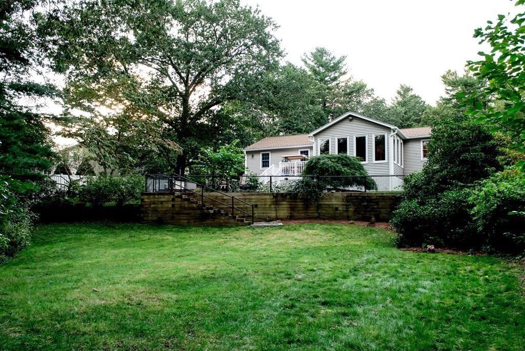 39 George Brown Street Billerica, MA 01821 - Photo 27 of 29 a front view of a house with yard and green space