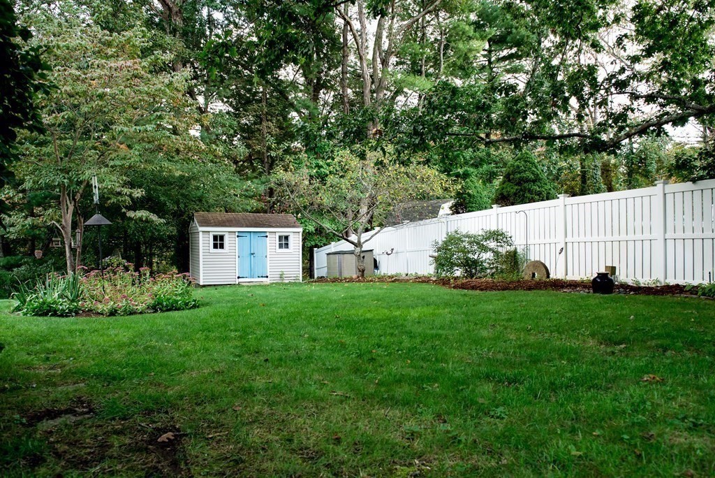 39 George Brown Street Billerica, MA 01821 - Photo 29 of 29 a view of a house with backyard and garden
