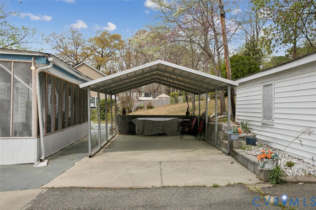 6266 Richmond Road Williamsburg, VA 23188 - Photo 24 of 27 a view of a two chairs in the patio