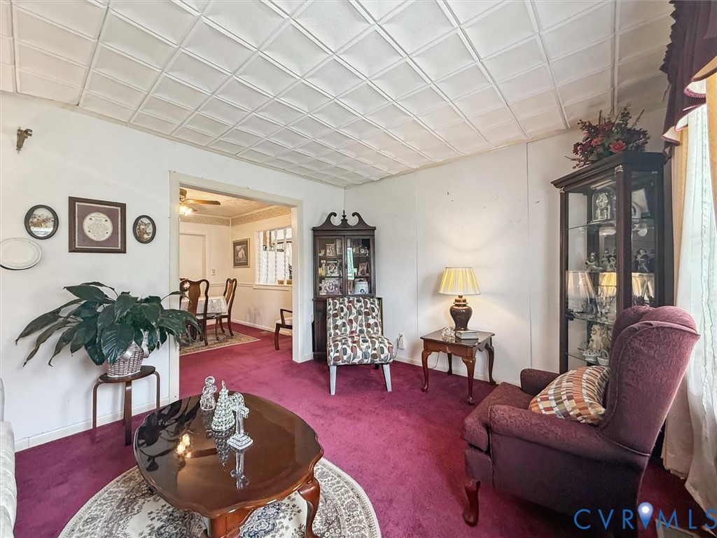 6266 Richmond Road Williamsburg, VA 23188 - Photo 3 of 27 a living room with furniture and wooden floor