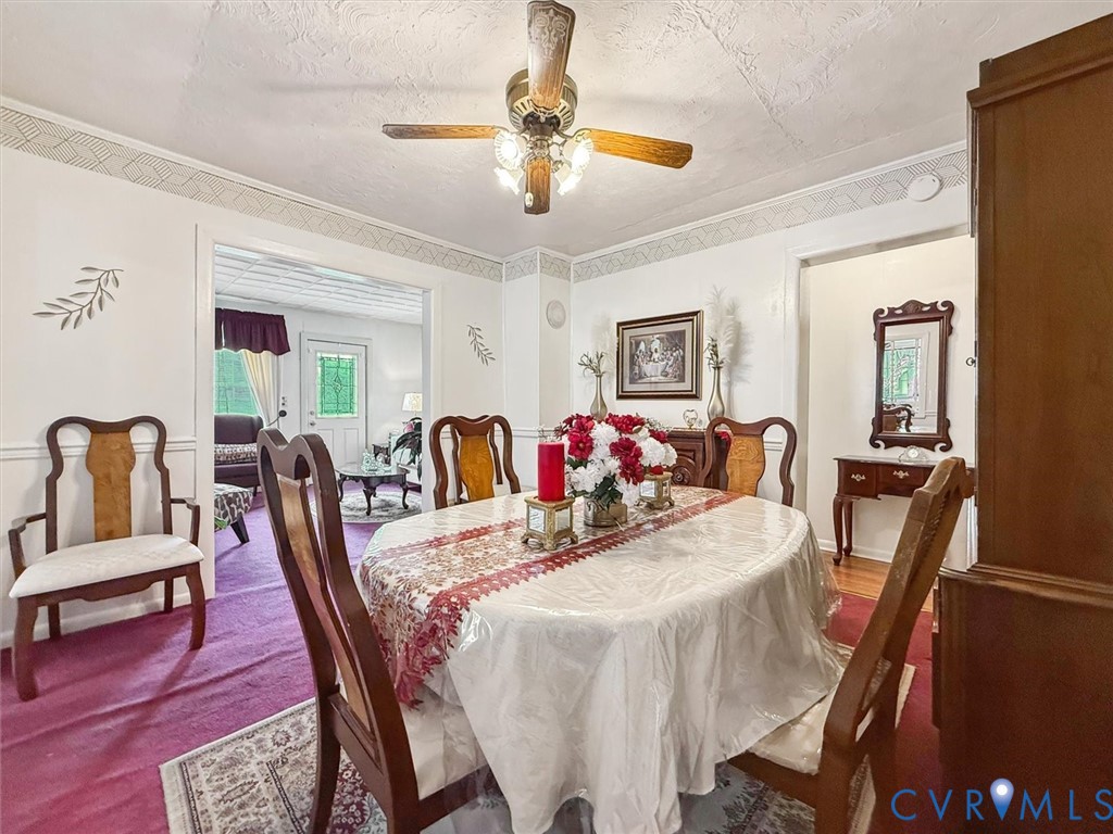 6266 Richmond Road Williamsburg, VA 23188 - Photo 7 of 27 a view of a dining room with furniture