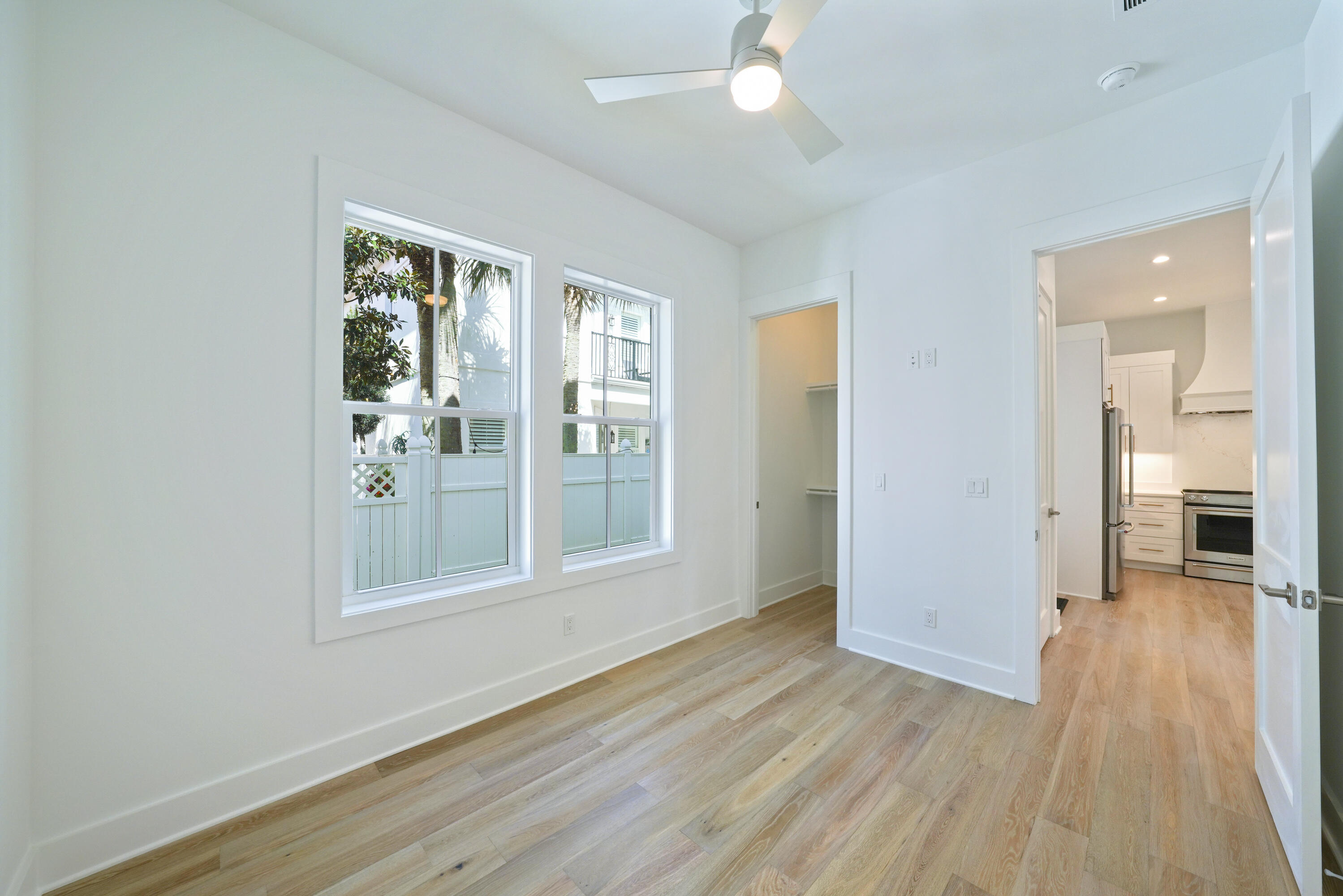 4734 Amhurst Circle Destin, FL 32541 - Photo 13 of 28 Image #13 | Bedroom with windows and wal