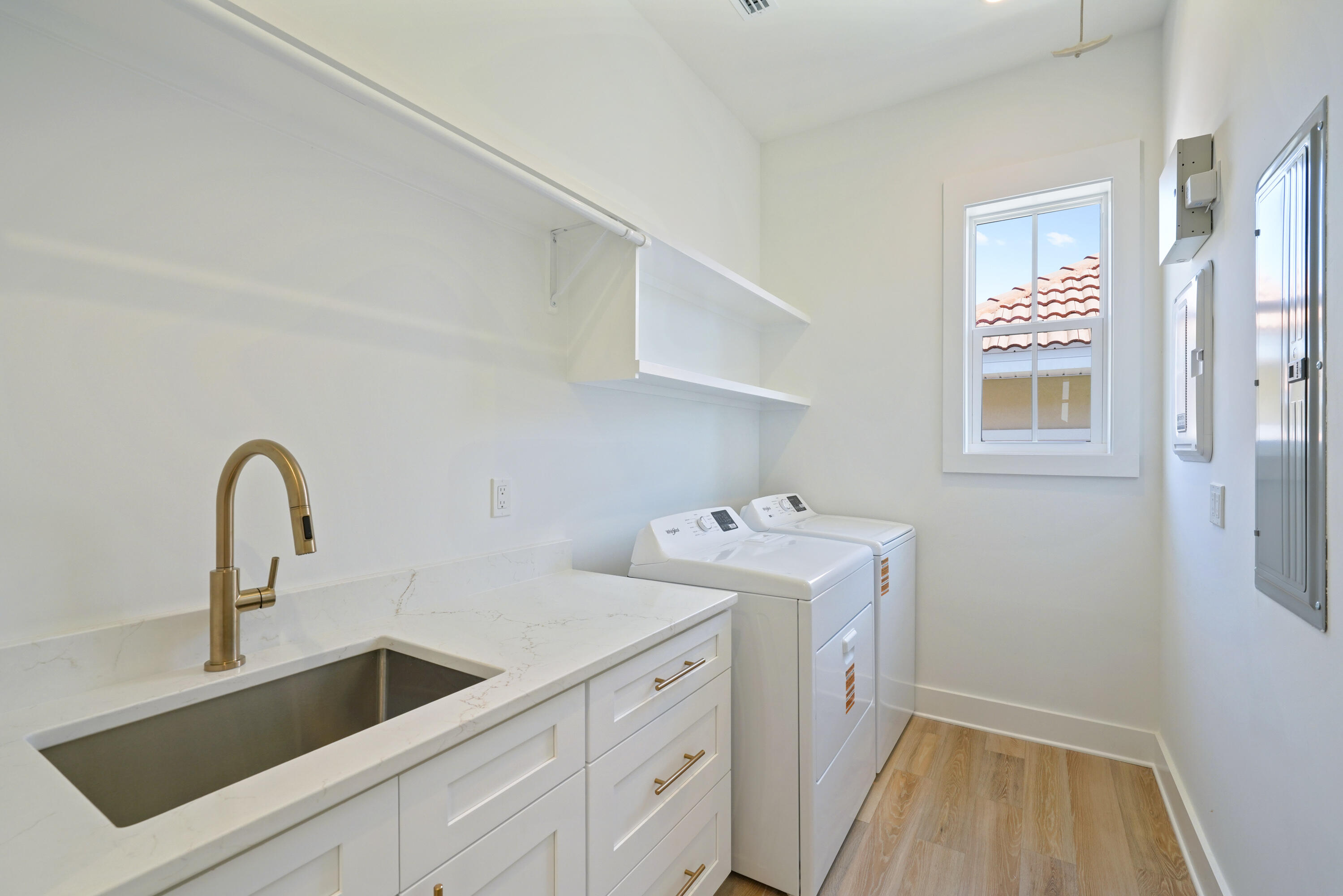 4734 Amhurst Circle Destin, FL 32541 - Photo 21 of 28 Image #21 | Laundry room with sink, cabi