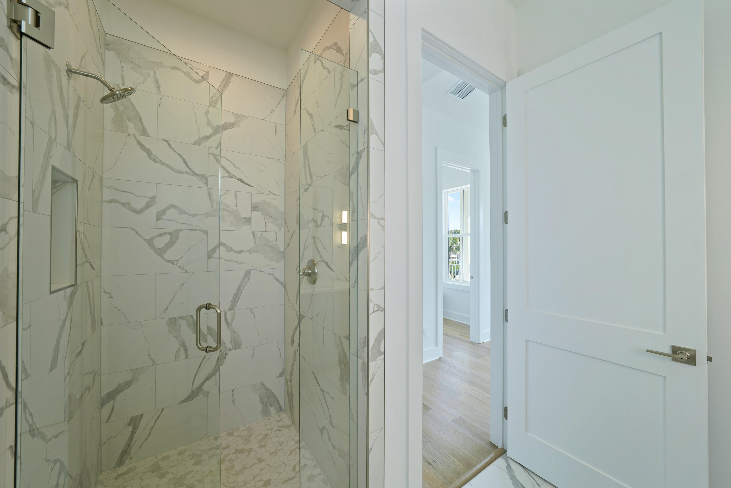 4734 Amhurst Circle Destin, FL 32541 - Photo 26 of 28 Image #26 | Glass-enclosed shower with m