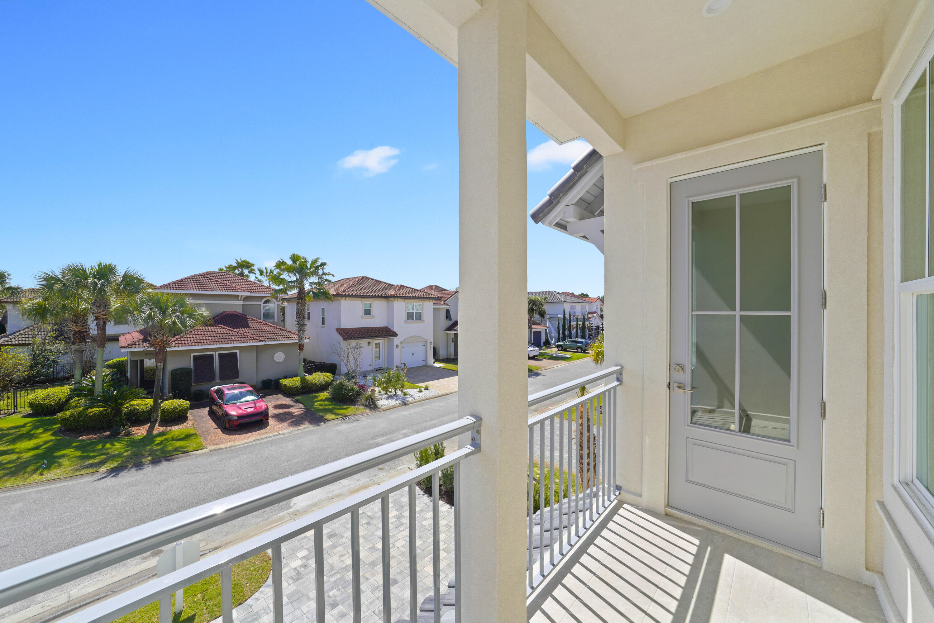 4734 Amhurst Circle Destin, FL 32541 - Photo 27 of 28 Image #27 | Covered balcony with neighbo