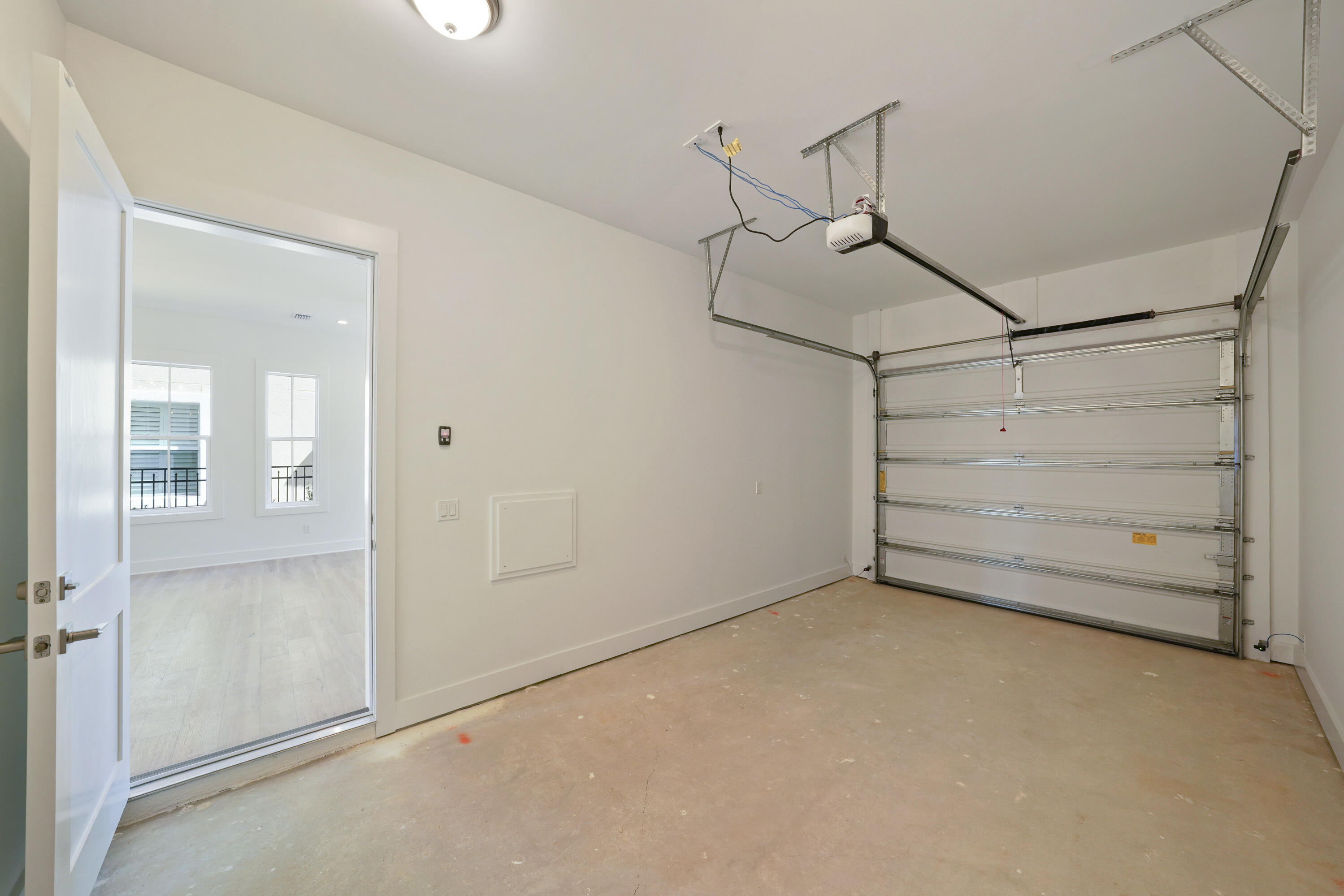 4734 Amhurst Circle Destin, FL 32541 - Photo 7 of 28 Image #7 | Garage interior with door and