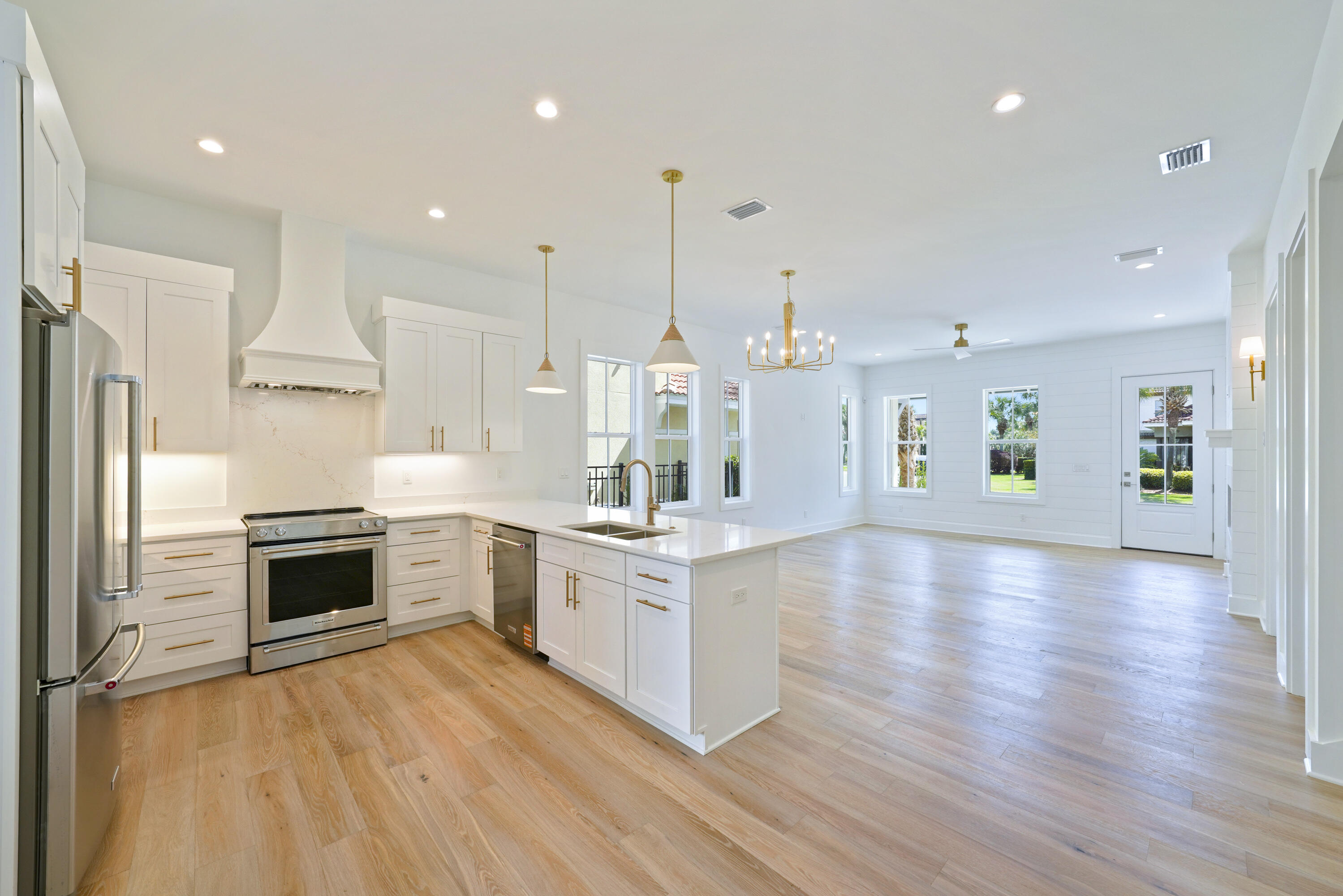 4734 Amhurst Circle Destin, FL 32541 - Photo 9 of 28 Image #9 | Open kitchen and living layou