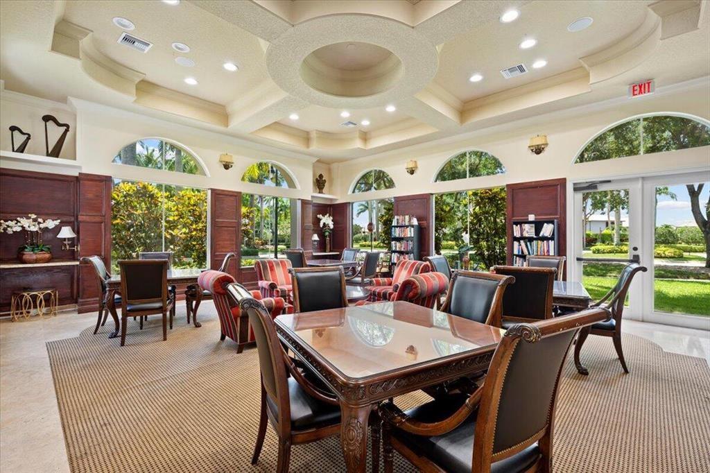 10295 Trianon Place Wellington, FL 33449 - Photo 19 of 26 a living room with fireplace furniture and a large window