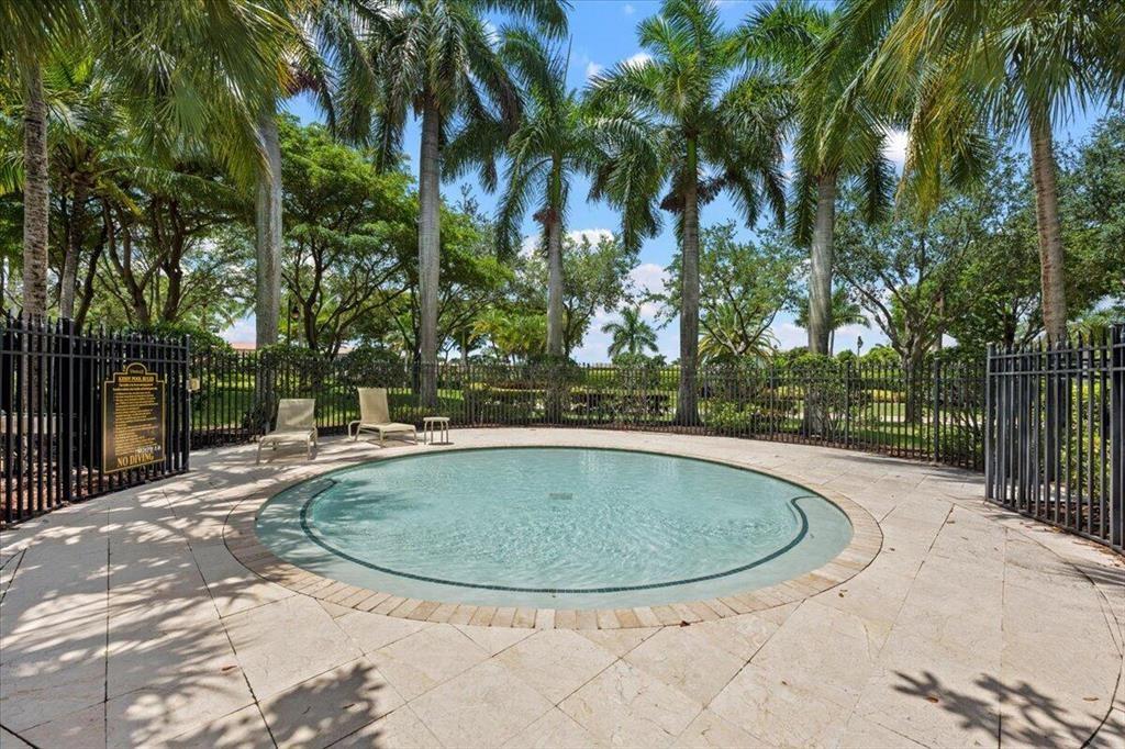 10295 Trianon Place Wellington, FL 33449 - Photo 23 of 26 a view of outdoor space yard and swimming pool