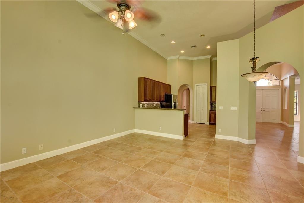 10295 Trianon Place Wellington, FL 33449 - Photo 6 of 26 a view of a livingroom with a furniture