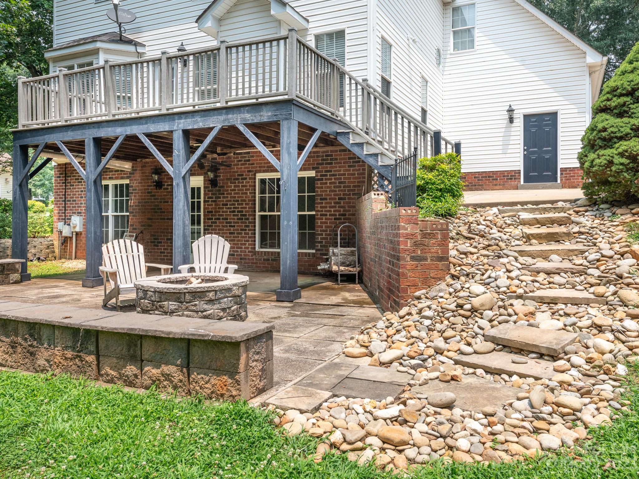 518 Maple Ridge Circle Salisbury, NC 28147 - Photo 11 of 45 a front view of a house with garden