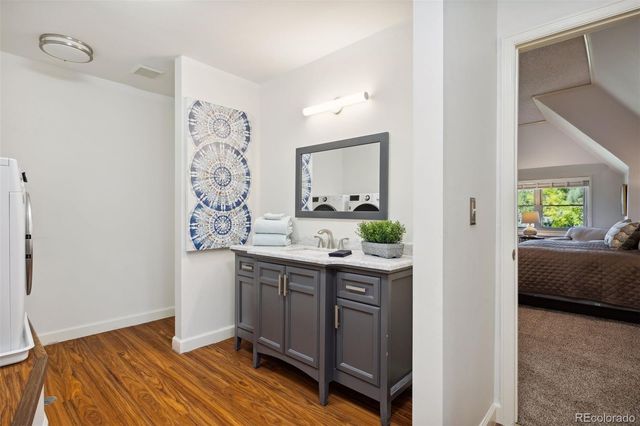 a view of bathroom with dual sinks