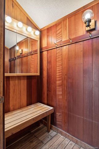 a view of a balcony with wooden floor