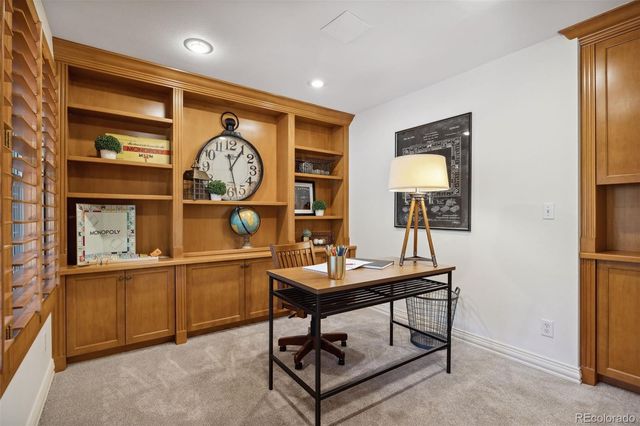 a view of a room with a table and a chair
