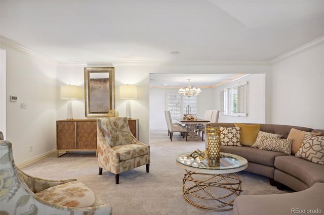 a living room with furniture and a couch