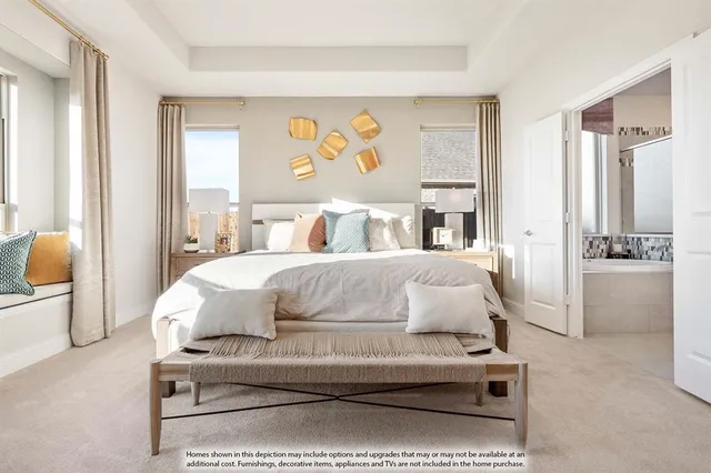 a bedroom with a bed and a cabinets