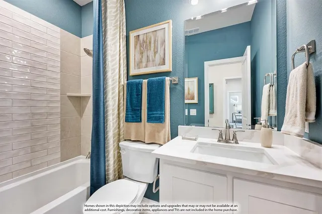 a bathroom with a sink and a toilet