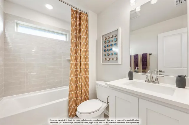 a bathroom with a sink toilet a mirror and shower