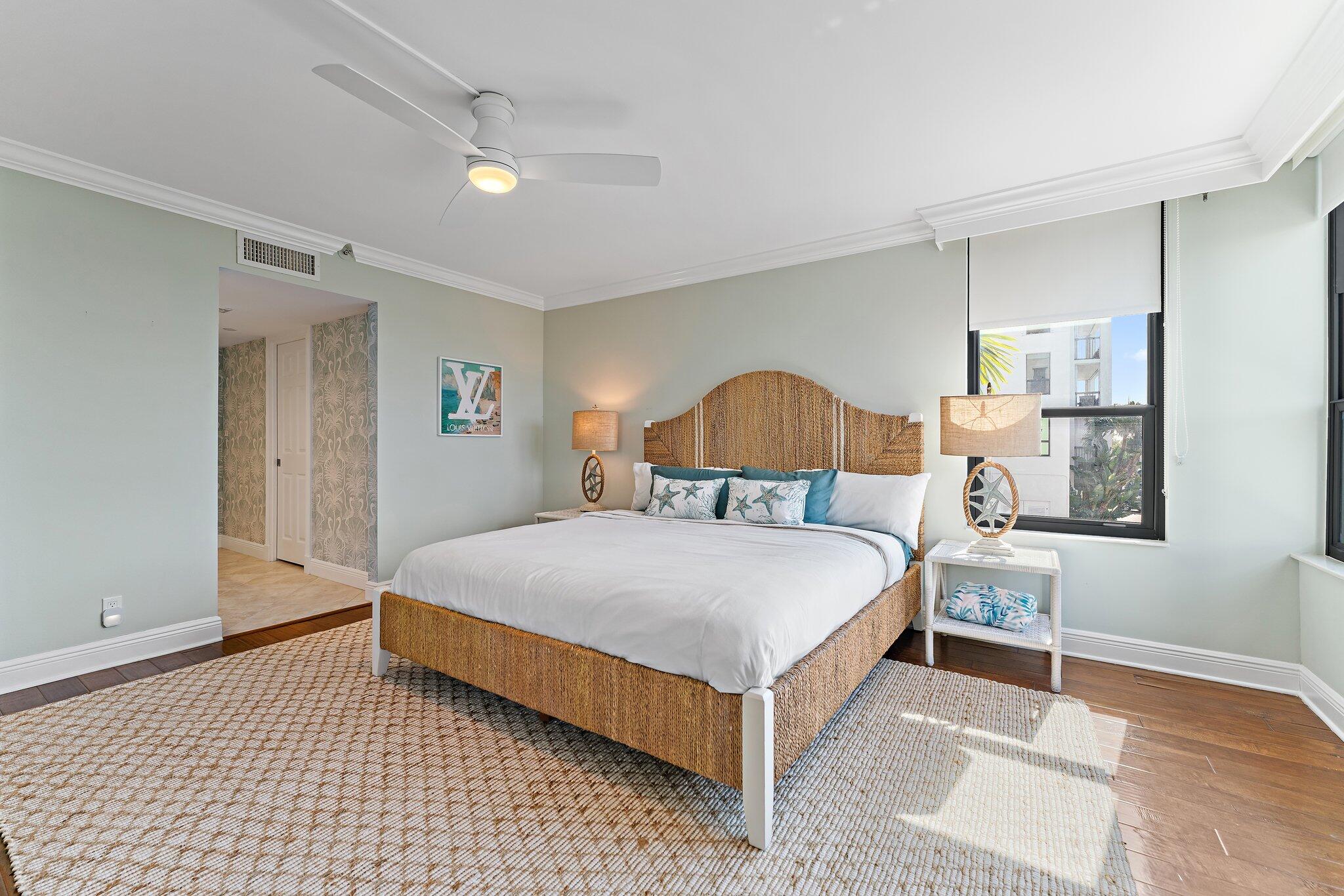 19670 South Beach Road, Unit B303 Jupiter, FL 33469 - Photo 43 of 104 a bedroom with a bed and window