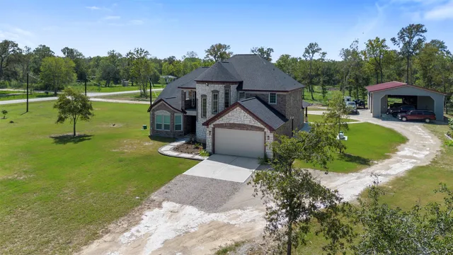 $699,900 | 19920 County Road 647, Guy, TX 77444