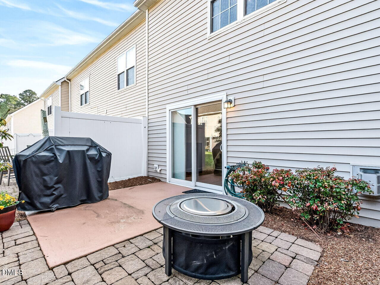 422 Intern Way Durham, NC 27713 - Photo 32 of 33 a view of a backyard with plants and furniture