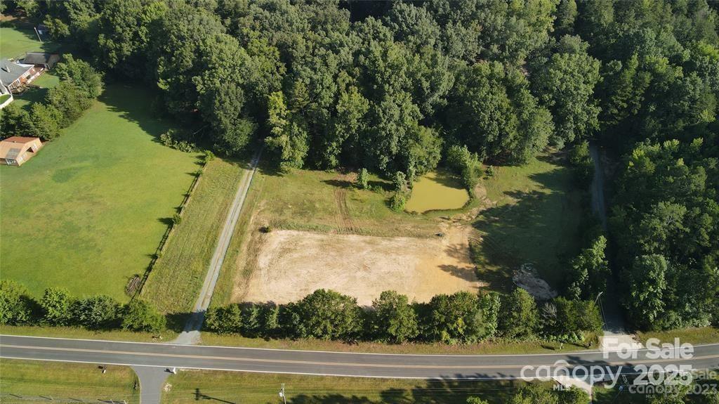 7204 Nesbit Road Waxhaw, NC 28173 - Photo 4 of 25 a view of a yard with an outdoor space