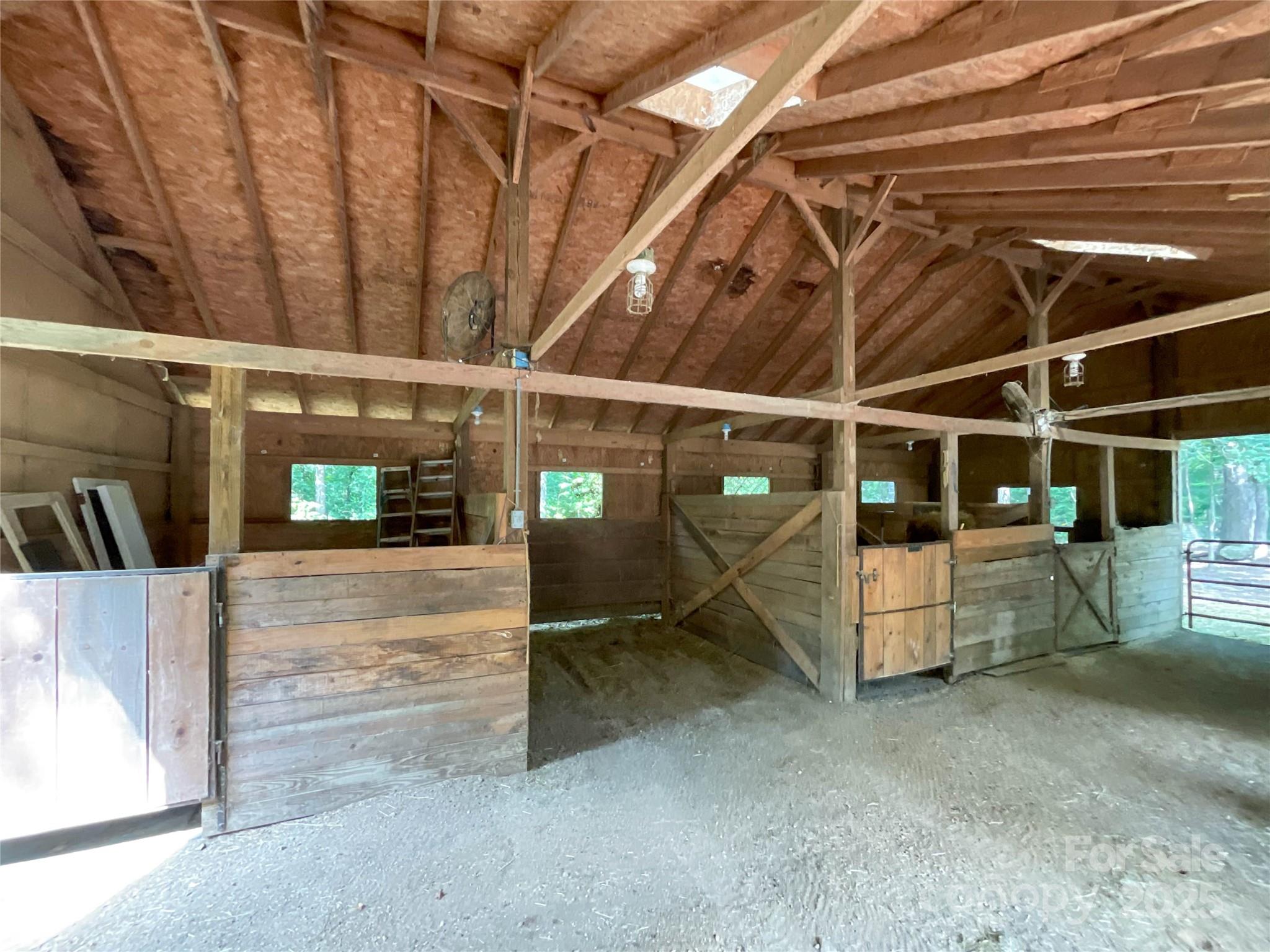 7204 Nesbit Road Waxhaw, NC 28173 - Photo 10 of 25 a view of a garage with wooden wall