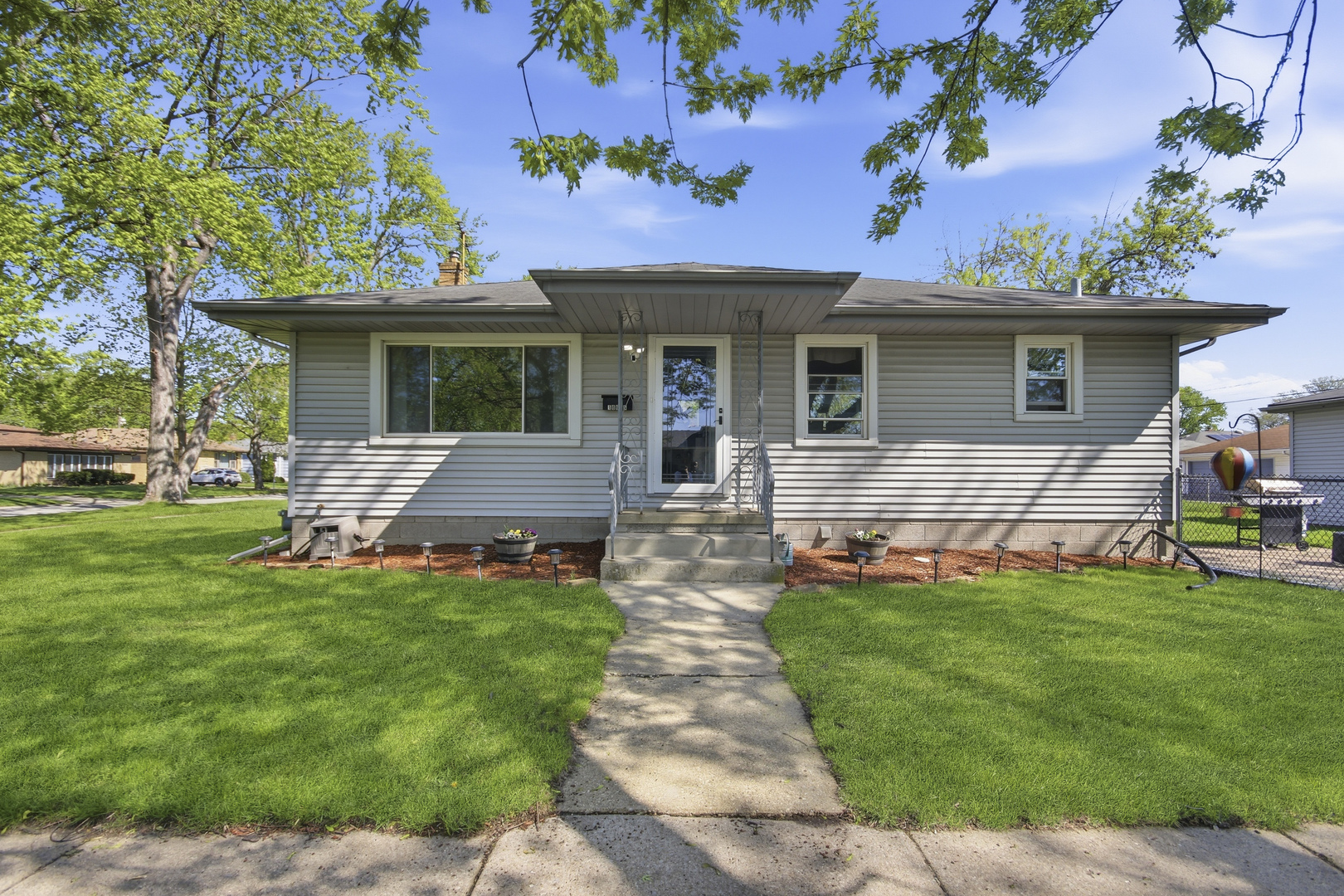 18655 Sherman Street Lansing, IL 60438 - Photo 1 of 21 a front view of house with yard outdoor seating and green space