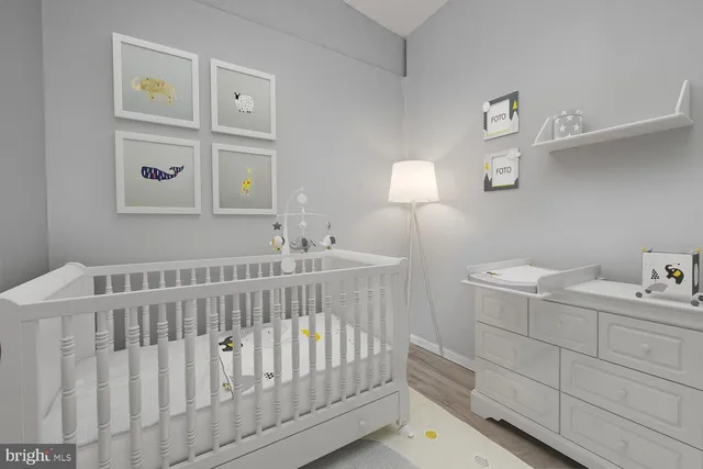 a bedroom with a bed and chair