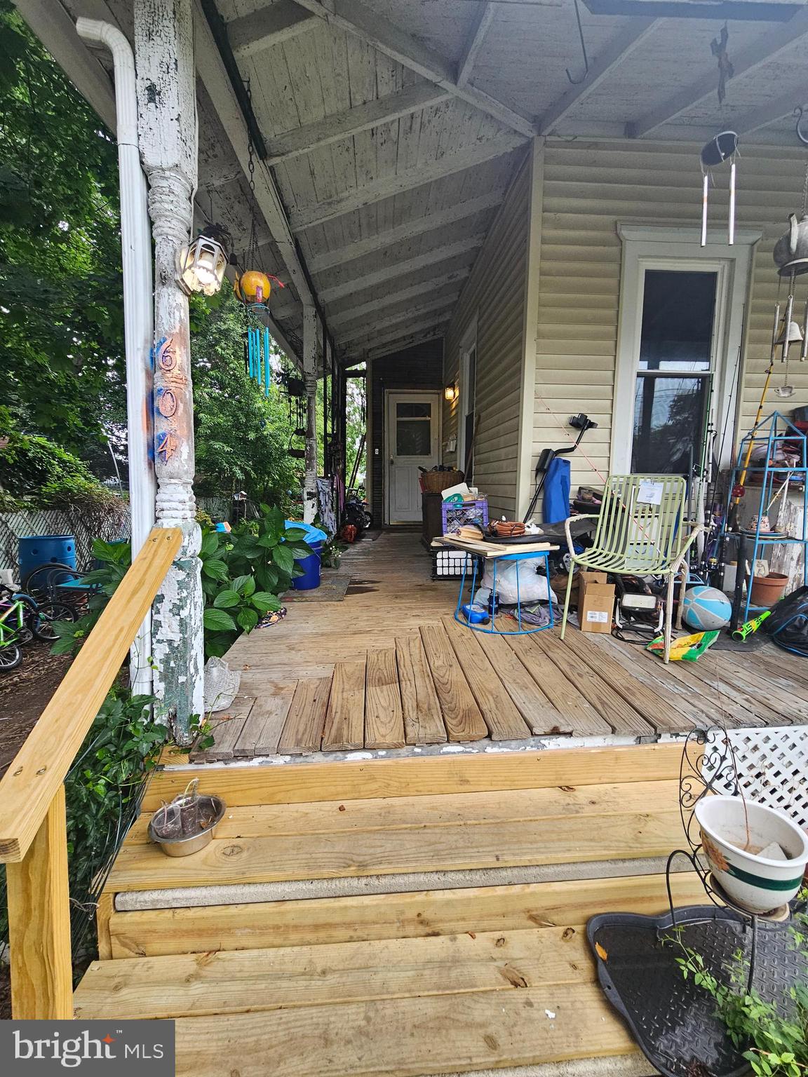 604 Spruce Street Delanco, NJ 08075 - Photo 2 of 9 a view of a two chair and tables in the balcony