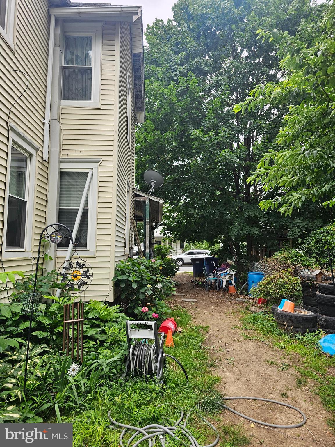 604 Spruce Street Delanco, NJ 08075 - Photo 3 of 9 a backyard of a house with fire pit and outdoor seating