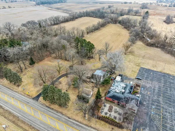 a view of snow covered with trees