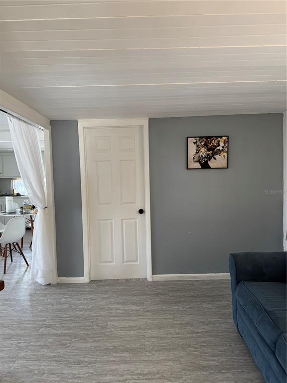 7289 Toucan Trail Spring Hill, FL 34606 - Photo 20 of 27 a view of a livingroom with furniture and staircase