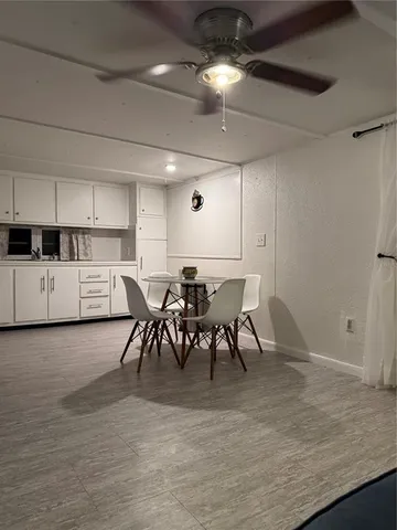a view of a kitchen and dining room
